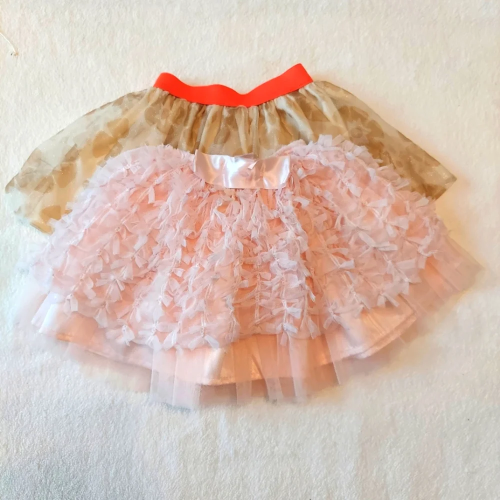 Tutu's 2 each girls one golden one pink size 2t